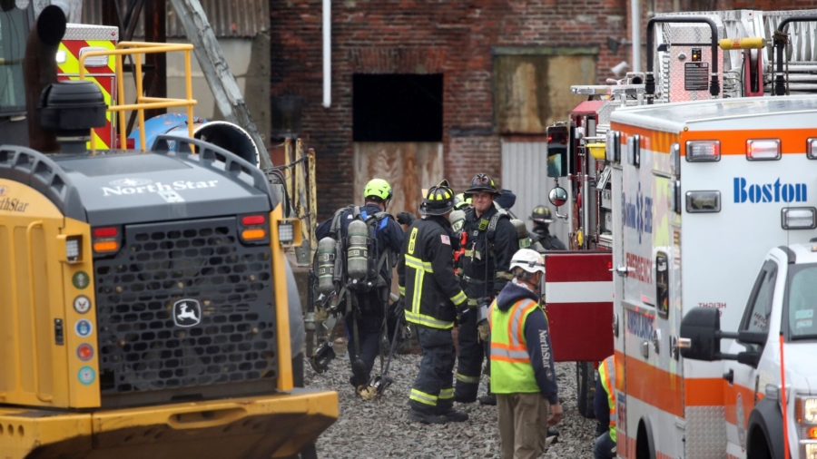 Boston Firefighters Pull Hurt Worker From Collapsed Building