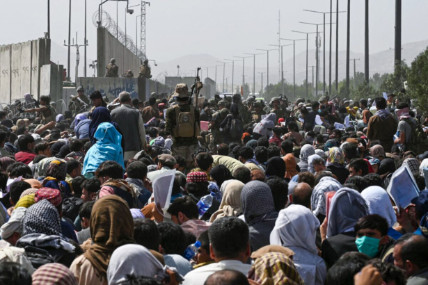 Afghans gather on a roadside